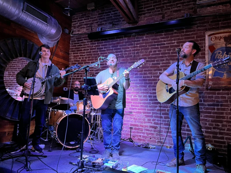 Band playing on stage at Speakeasy Carrboro