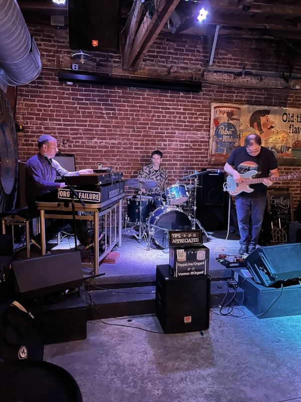 Band playing on stage at the Speakeasy in Carrboro